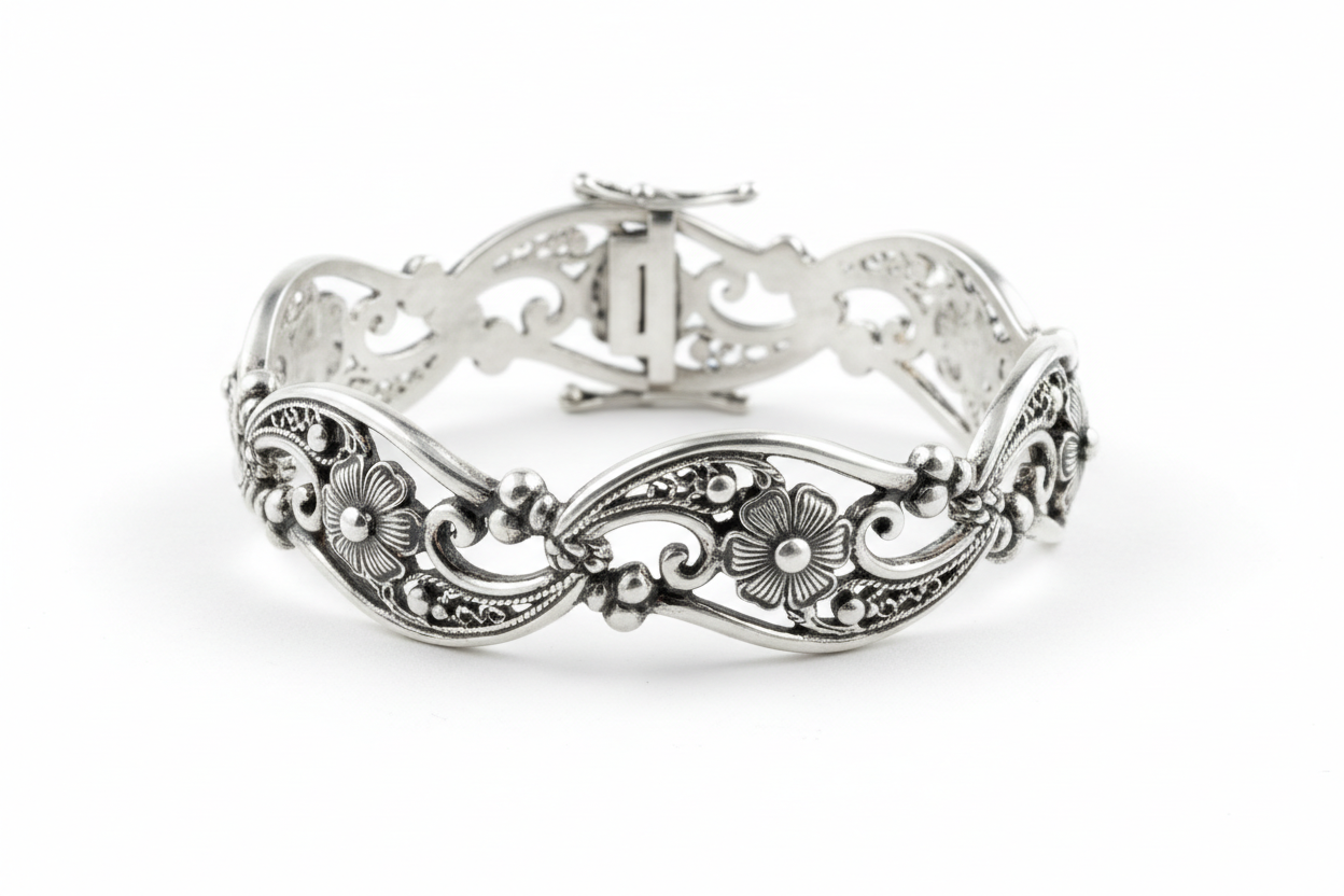 Beautiful handcrafted silver bracelet featuring intricate detailing and a comfortable fit. This versatile piece complements any outfit, from casual to formal.

Made from sterling silver