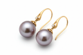 Timeless pearl earrings that add a touch of sophistication to any look. These classic pieces feature lustrous freshwater pearls set in elegant settings.

Genuine freshwater pearls
Hypoallergenic metal settings